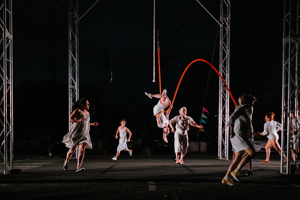 Performers from Vulcana on scaffold during performance of Rear Vision